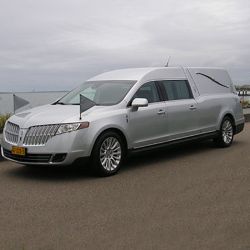 Huur rouwauto zilvergrijs met chauffeur voor uitvaart 2 uur
